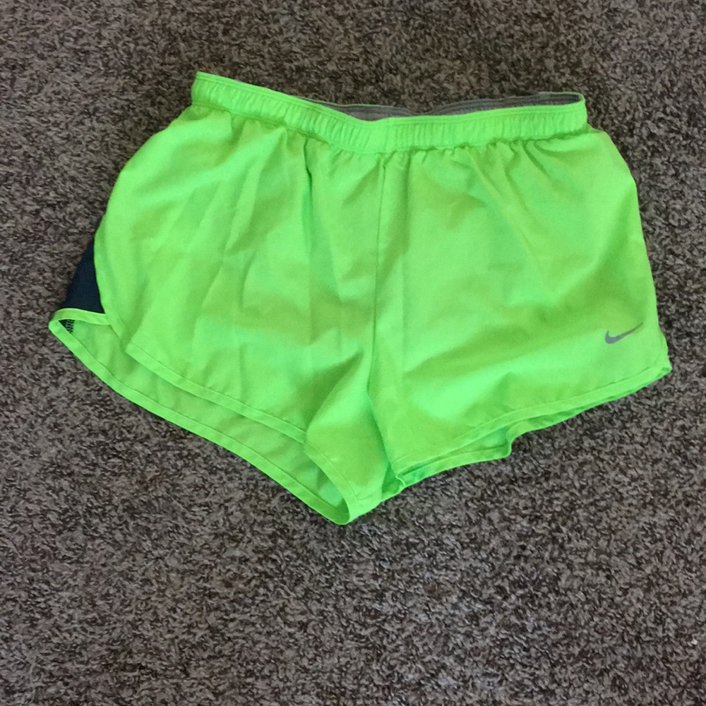 Lime green Nike running shorts, size S
